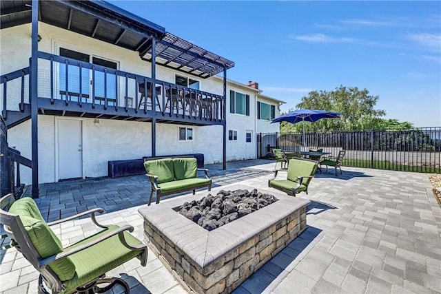 1864 Winterwarm Dr, Fallbrook, CA 92028 - view of patio with a balcony and an outdoor living space with a fire pit