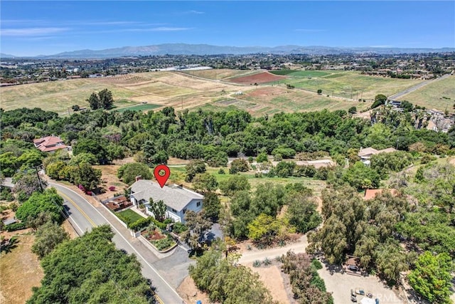 drone / aerial view featuring a mountain view