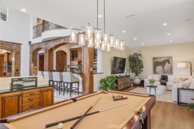 recreation room with an inviting chandelier, light wood-style flooring, recessed lighting, billiards, and visible vents
