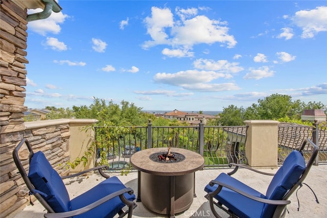balcony featuring a fire pit