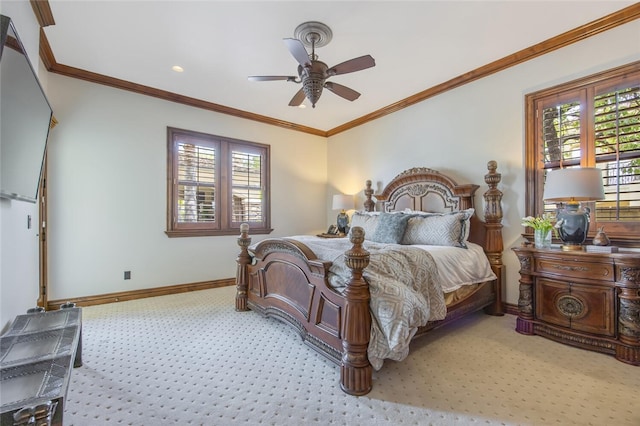 bedroom featuring crown molding, baseboards, a ceiling fan, and light colored carpet