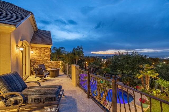balcony with a fire pit