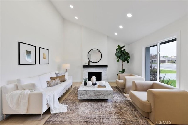 24531 Bunbury Dr, Lake Forest, CA 92630 - living area with recessed lighting, a fireplace, wood finished floors, and high vaulted ceiling