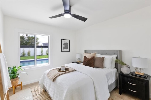 24531 Bunbury Dr, Lake Forest, CA 92630 - bedroom with baseboards, a ceiling fan, and light wood-style flooring