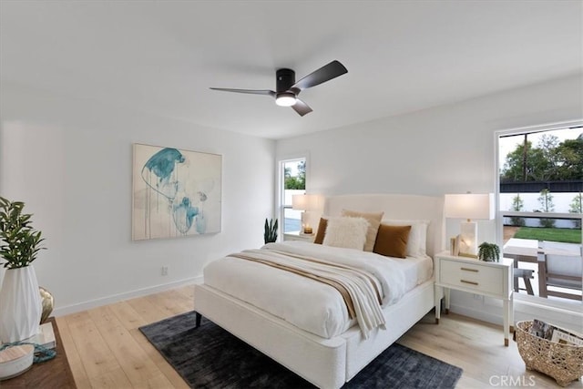24531 Bunbury Dr, Lake Forest, CA 92630 - bedroom with baseboards, a ceiling fan, and wood finished floors