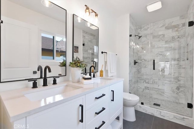 24531 Bunbury Dr, Lake Forest, CA 92630 - bathroom featuring double vanity, a sink, toilet, and a shower stall