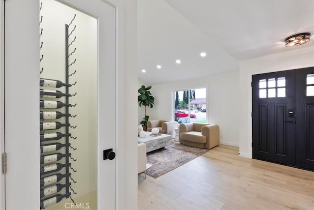 24531 Bunbury Dr, Lake Forest, CA 92630 - entrance foyer with recessed lighting, baseboards, lofted ceiling, and light wood-type flooring