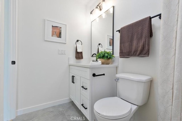 24531 Bunbury Dr, Lake Forest, CA 92630 - full bathroom with vanity, baseboards, tile patterned floors, and toilet