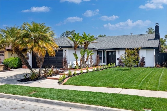 24531 Bunbury Dr, Lake Forest, CA 92630 - ranch-style house featuring an attached garage, a front lawn, stucco siding, a chimney, and driveway