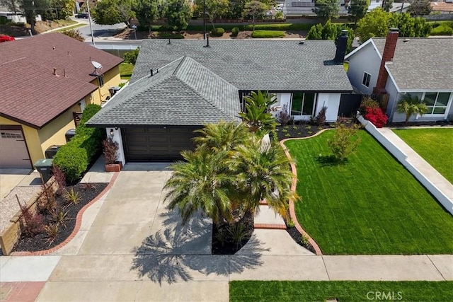 24531 Bunbury Dr, Lake Forest, CA 92630 - view of front of property with driveway, a front yard, roof with shingles, a residential view, and a garage