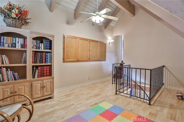 27720 St Bernard Ln, Lake Arrowhead, CA 92352 - interior space with high vaulted ceiling, a ceiling fan, baseboards, wood finished floors, and beamed ceiling