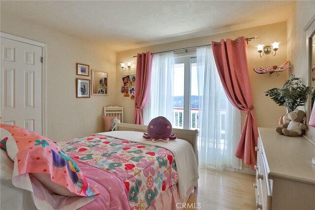 27720 St Bernard Ln, Lake Arrowhead, CA 92352 - bedroom featuring light wood-style flooring
