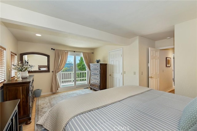 27720 St Bernard Ln, Lake Arrowhead, CA 92352 - bedroom with baseboards, recessed lighting, light wood-style flooring, and access to exterior