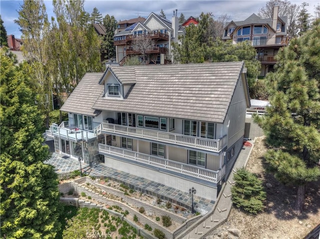 27720 St Bernard Ln, Lake Arrowhead, CA 92352 - rear view of house with a balcony