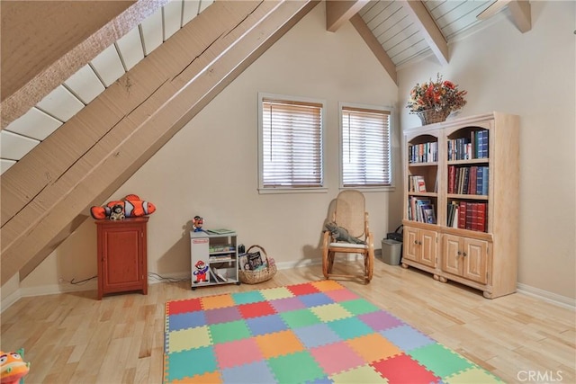 27720 St Bernard Ln, Lake Arrowhead, CA 92352 - game room featuring baseboards, lofted ceiling with beams, and light wood finished floors