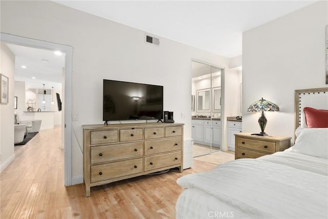655 Via Colinas, Thousand Oaks, CA 91362 - bedroom with light wood-type flooring, connected bathroom, baseboards, and recessed lighting