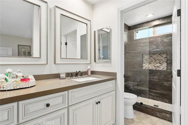 655 Via Colinas, Thousand Oaks, CA 91362 - bathroom featuring a tile shower, toilet, and vanity