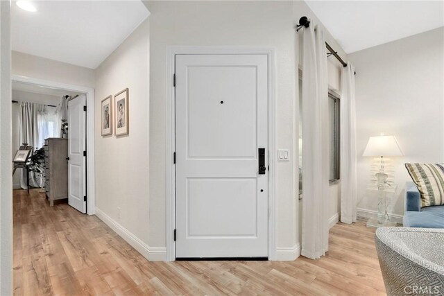 655 Via Colinas, Thousand Oaks, CA 91362 - entryway featuring light wood finished floors, baseboards, and a barn door