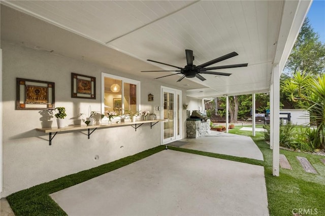 view of patio featuring ceiling fan