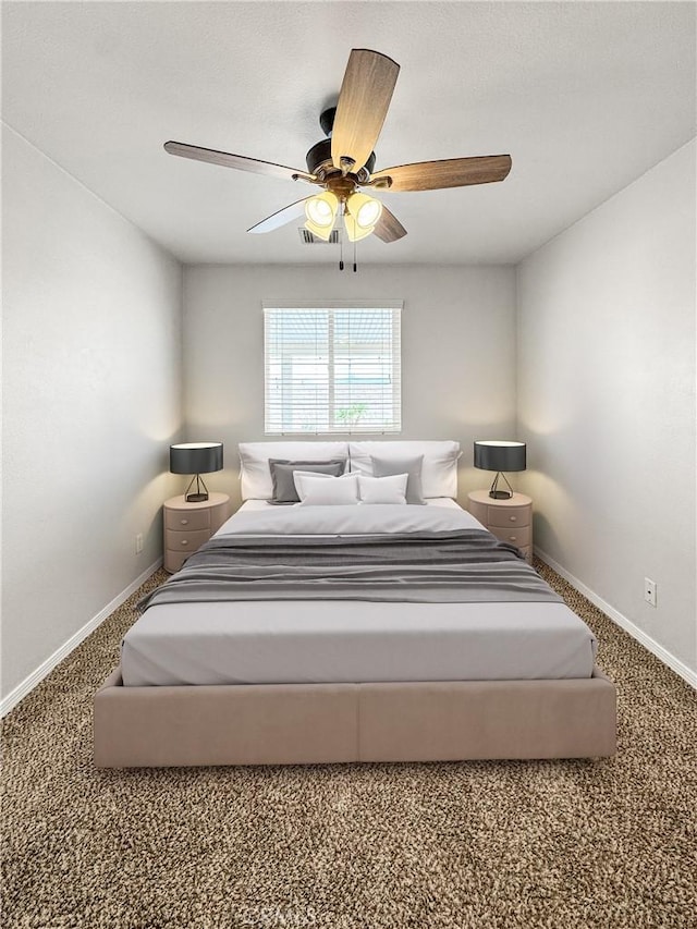 509 Kristi Ln, Blythe, CA 92225 - bedroom with baseboards, carpet flooring, and a ceiling fan
