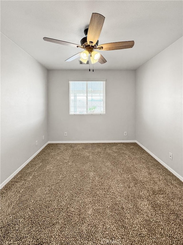 509 Kristi Ln, Blythe, CA 92225 - carpeted empty room with baseboards and a ceiling fan