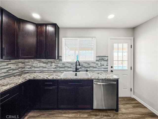 509 Kristi Ln, Blythe, CA 92225 - kitchen featuring stainless steel dishwasher, decorative backsplash, a sink, and plenty of natural light
