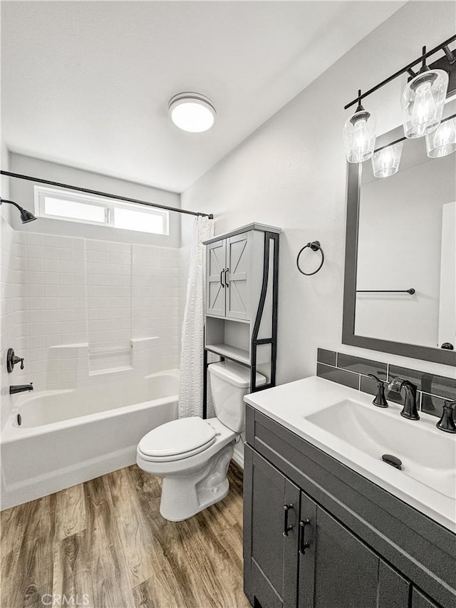 509 Kristi Ln, Blythe, CA 92225 - full bathroom featuring vanity, shower / tub combo with curtain, wood finished floors, and toilet