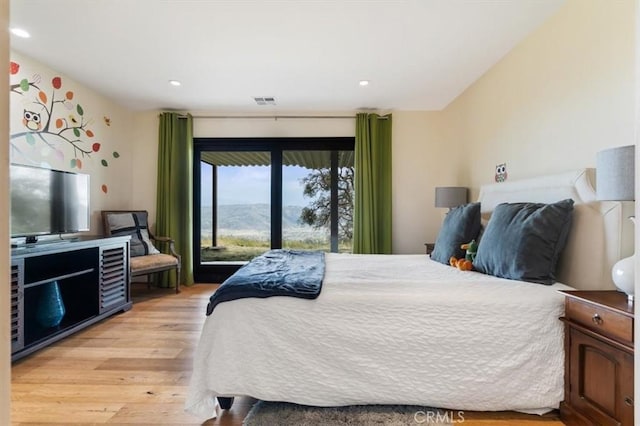 30140 Tuttle Ct, Tehachapi, CA 93561 - bedroom featuring light wood-type flooring, recessed lighting, visible vents, and access to exterior