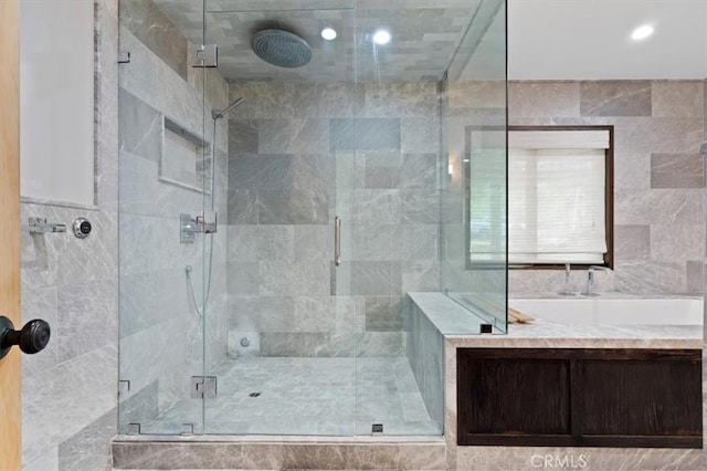 30140 Tuttle Ct, Tehachapi, CA 93561 - full bath with recessed lighting, tile walls, and a stall shower