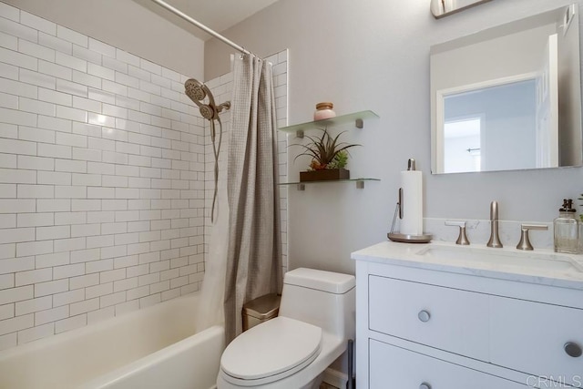 bathroom featuring vanity, toilet, and shower / tub combo