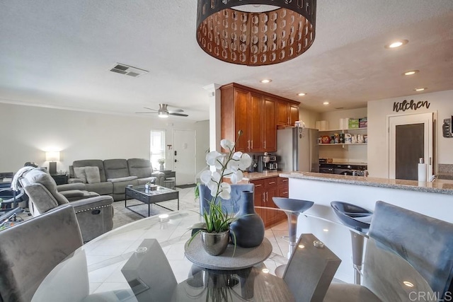 dining area with visible vents, recessed lighting, ceiling fan, and light tile patterned floors