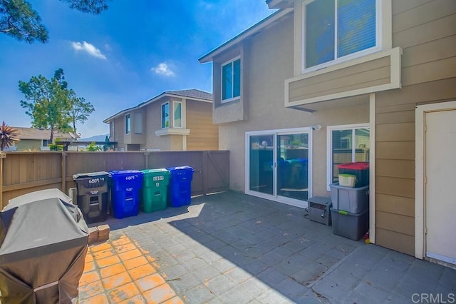 view of patio with fence