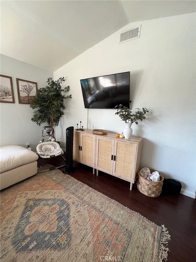 8871 Knollwood Pl, Rancho Cucamonga, CA 91730 - living room featuring wood finished floors and vaulted ceiling