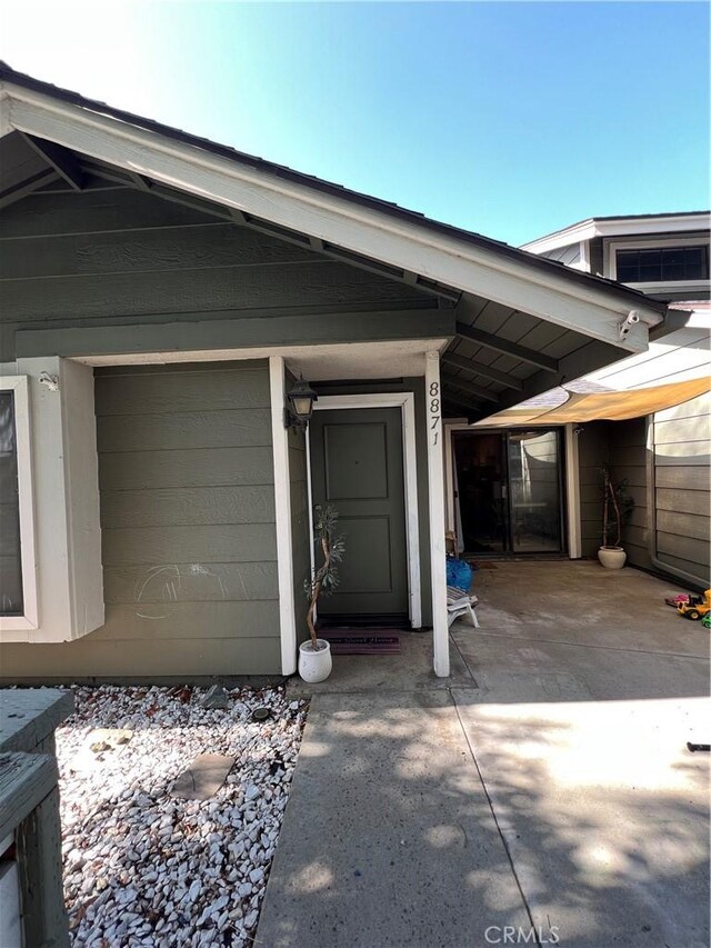 8871 Knollwood Pl, Rancho Cucamonga, CA 91730 - view of exterior entry with concrete driveway