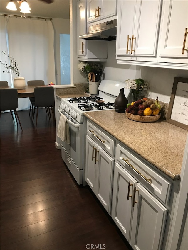 8871 Knollwood Pl, Rancho Cucamonga, CA 91730 - kitchen featuring white range with gas cooktop, under cabinet range hood, and dark wood-type flooring