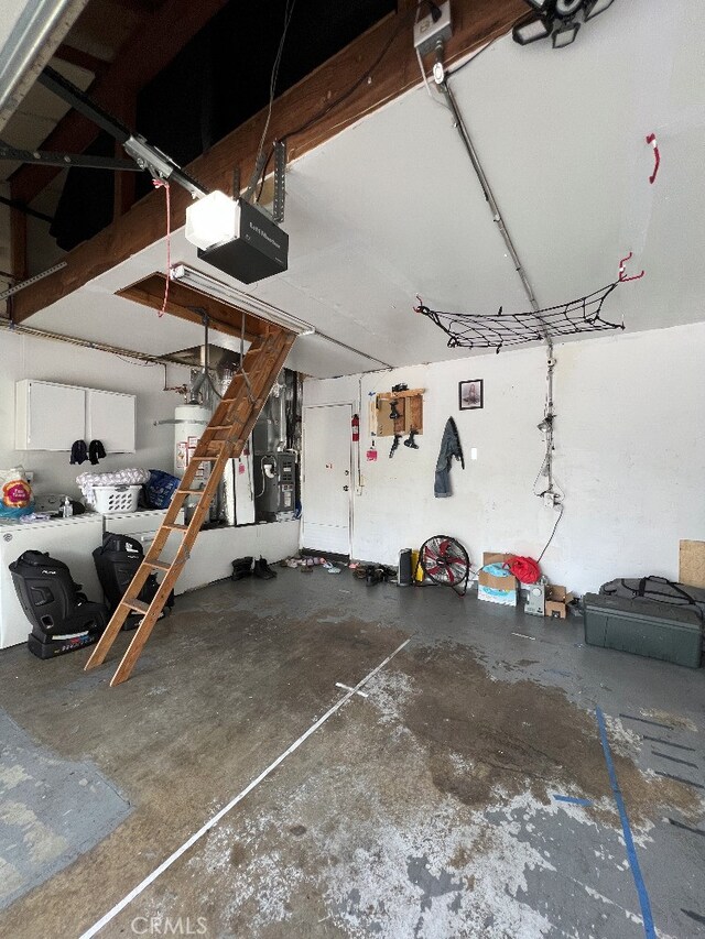 8871 Knollwood Pl, Rancho Cucamonga, CA 91730 - garage with a garage door opener, water heater, and heating unit