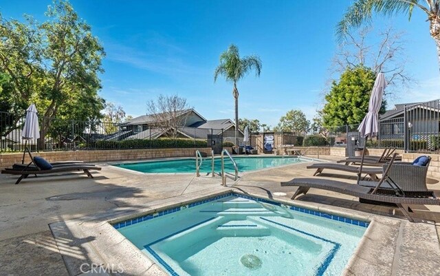 8871 Knollwood Pl, Rancho Cucamonga, CA 91730 - community pool with a community hot tub and a patio