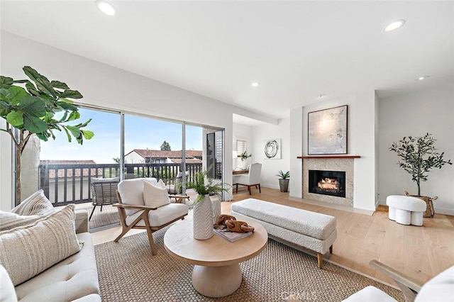 44 Cypress Way, Rolling Hills Estates, CA 90274 - living area with light wood finished floors, recessed lighting, baseboards, and a fireplace with flush hearth