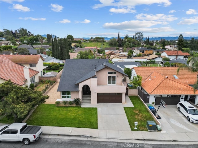 aerial view with a residential view and a mountain view