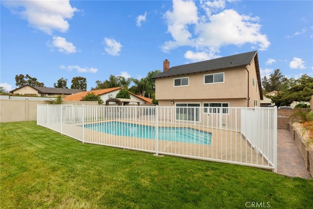 view of pool with a fenced in pool, a fenced backyard, and a yard