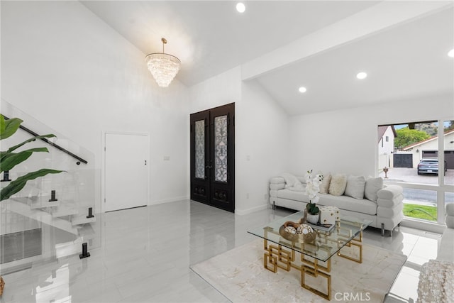 foyer entrance featuring high vaulted ceiling, french doors, recessed lighting, and visible vents