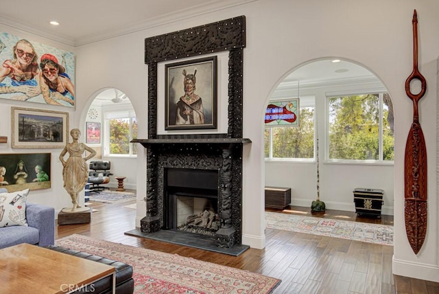 5594 Avenida Sosiega W Unit B, Laguna Woods, CA 92637 - living room featuring crown molding, baseboards, wood finished floors, and a premium fireplace