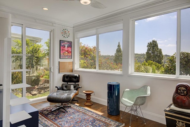 5594 Avenida Sosiega W Unit B, Laguna Woods, CA 92637 - sunroom / solarium featuring crown molding, baseboards, and wood finished floors