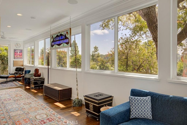 5594 Avenida Sosiega W Unit B, Laguna Woods, CA 92637 - sunroom with ornamental molding, wood finished floors, and a healthy amount of sunlight