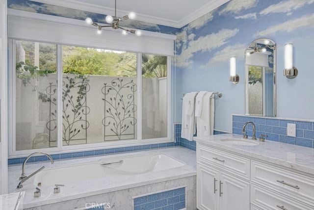 5594 Avenida Sosiega W Unit B, Laguna Woods, CA 92637 - bathroom with vanity, ornamental molding, backsplash, and a bath