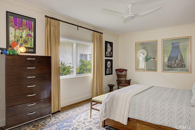 5594 Avenida Sosiega W Unit B, Laguna Woods, CA 92637 - bedroom featuring crown molding, baseboards, ceiling fan, and wood finished floors