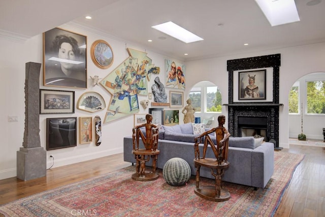5594 Avenida Sosiega W Unit B, Laguna Woods, CA 92637 - living area featuring a skylight, plenty of natural light, and crown molding
