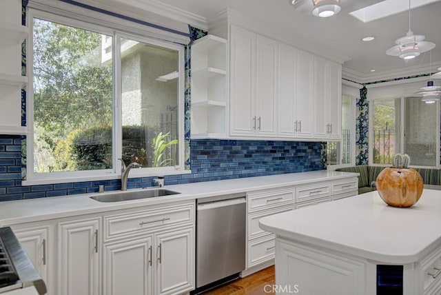 5594 Avenida Sosiega W Unit B, Laguna Woods, CA 92637 - kitchen with open shelves, dishwasher, a sink, light countertops, and white cabinetry