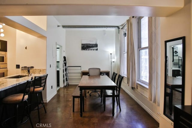215 W 7th St Unit 803, Los Angeles, CA 90014 - dining area with concrete flooring and baseboards