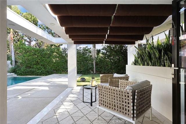 view of patio / terrace with an outdoor pool